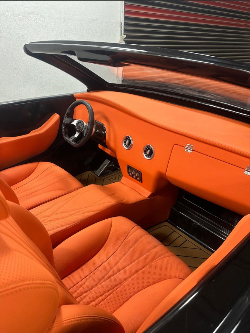 Hand-stitched leather interior and standard equipment